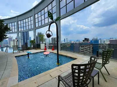 a pool on the roof of a building at The Atrium Jalan Ampang Elegant Fully Air-Con 3 BR Homestay in Kuala Lumpur
