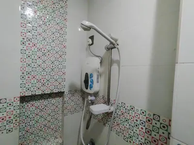 a shower in a bathroom with a shower head at Cahaya Hanson BilikXpert in Kuala Lumpur