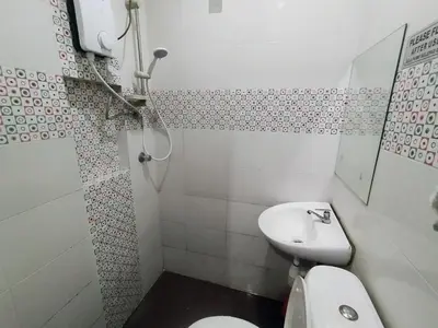 a bathroom with a toilet and a sink at Cahaya Hanson BilikXpert in Kuala Lumpur