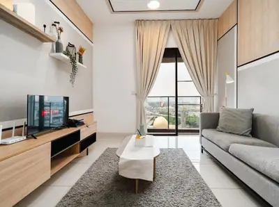 a living room with a couch and a tv at Continew Facing TRX View 10MIN TO KLCC With PS4 in Kuala Lumpur