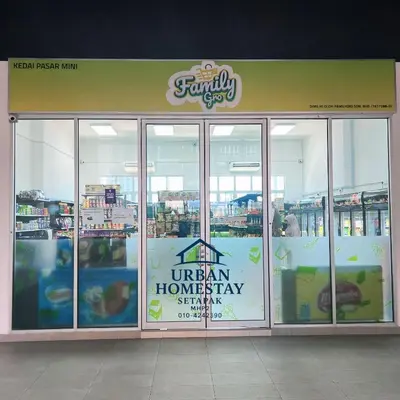a store with a sign on the front of it at Urban Homestay Setapak MHP2 Kids Friendly in Kuala Lumpur