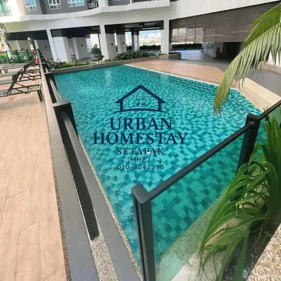 a swimming pool with a sign that reads ullah homestead stay strategy at Urban Homestay Setapak MHP2 Kids Friendly in Kuala Lumpur