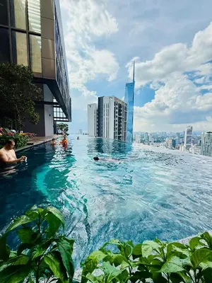 a swimming pool on the roof of a building at Lucentia Residence in Kuala Lumpur