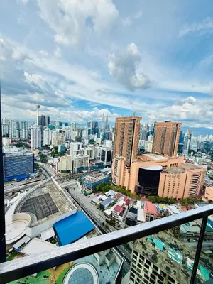 a view of a city with tall buildings at Lucentia Residence in Kuala Lumpur
