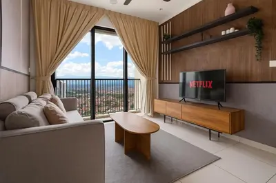 a living room with a tv and a large window at Kenwingston Platz 15Mins To KLCC Fit 9Pax Modern Interior B25 in Kuala Lumpur