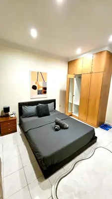 a bedroom with a large bed in a room at Cozy Private Room in Taman Desa Shared Bathroom in Kuala Lumpur