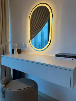 a dressing table with a mirror and a chair at Twin Tower Crush by KF in Kuala Lumpur