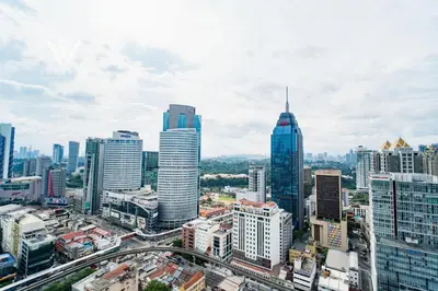 an overhead view of a city with tall buildings at Modern & Minimalist Studio at Majestic Residence KL in Kuala Lumpur