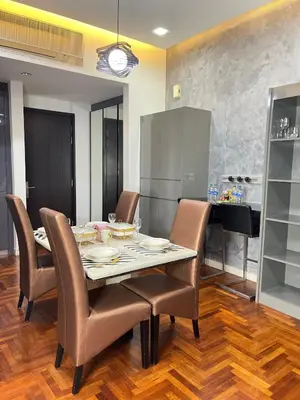 a dining room with a table and chairs at The Mews Klcc by Annie in Kuala Lumpur