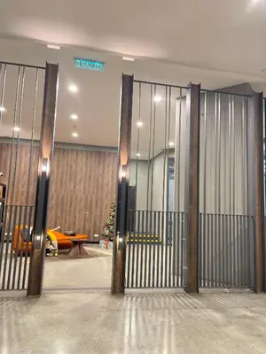 a lobby with a gate in a building at The Mews Klcc by Annie in Kuala Lumpur