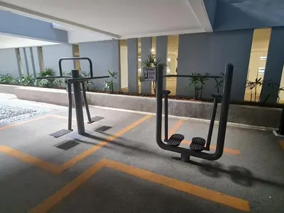 a empty parking lot with a bike rack in a building at Stylish Studio Neu Suites 10 mins to KLCC in Kuala Lumpur