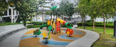 a playground in a park with a slide at Homestay at Trion KL in Kuala Lumpur