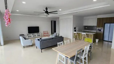 a living room with a couch and a table at Pomelo Meet Kuala Lumpur in Kuala Lumpur