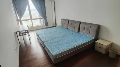 a bed sitting in a room with a window at Pomelo Meet Kuala Lumpur in Kuala Lumpur