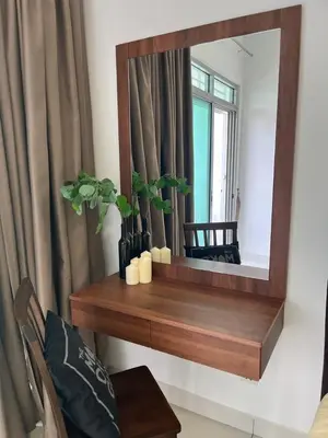 a mirror on a wall with a wooden shelf at Ampang 2pax Studio Ampang Point in Ampang
