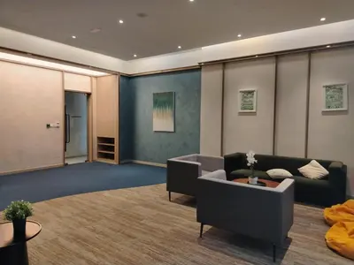 a living room with a couch and a table at Agile Bukit Bintang Homestay KLCC in Kuala Lumpur