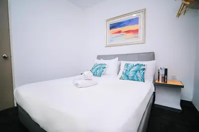 a large white bed in a hotel room at iBilik - Velocity Kuala Lumpur in Kuala Lumpur
