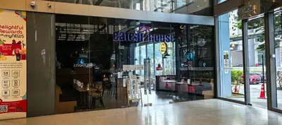 a store front of a building with a glass window at summer suite, KLCC in Kuala Lumpur