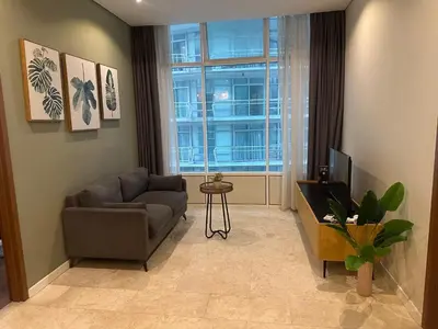 a living room with a couch and a tv and a window at Z-Home-skysuite \u4e24\u623f\u4e24\u536b in Kuala Lumpur