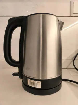 a black and silver tea kettle on a stove at The Excellent Axon Residence Bukit Bintang KL in Kuala Lumpur