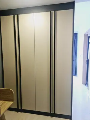 a closet with glass doors in a room at Grand infinitum suites KLCC by PN in Kuala Lumpur