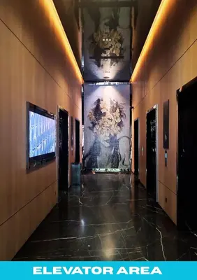 a hallway in a building with a painting on the wall at Star Executive View KLCC in Kuala Lumpur