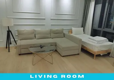 a living room with a couch and a coffee table at Star Executive View KLCC in Kuala Lumpur