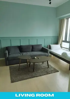 a living room with a couch and a coffee table at Star Executive View KLCC in Kuala Lumpur
