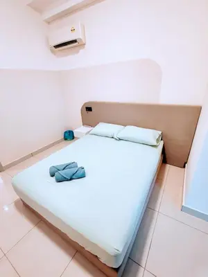 a bed in a room with a white bedvisor at Vivo Soho - 2 Bedrooms, Mid Valley, Bangsar South, Campus Rangers in Kuala Lumpur