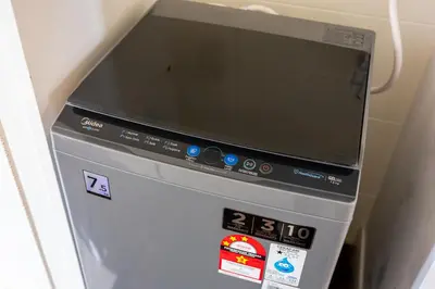 a computer screen sitting on top of a machine at The Noble Bungalow, 18pax 5R4B near Datuk Keramat, KL Pavilion in Kuala Lumpur