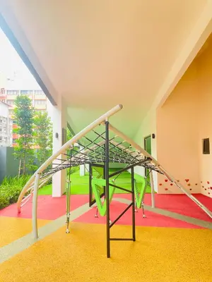 a staircase in a building with a metal railing at Majestic Residence KLCC by Nexus Suites in Kuala Lumpur