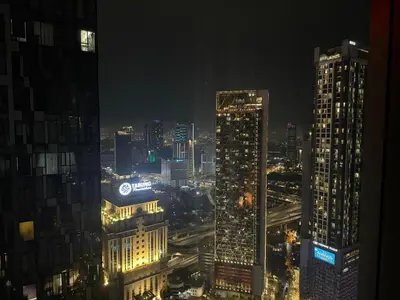 a view of a city skyline at night at KL Star Residance in Kuala Lumpur