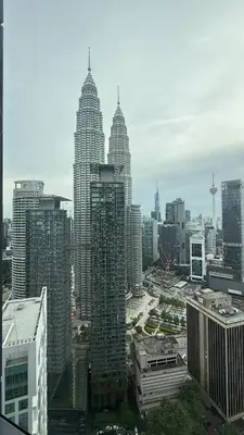 a view of a city with tall buildings at KL Star Residence KLCC in Kuala Lumpur
