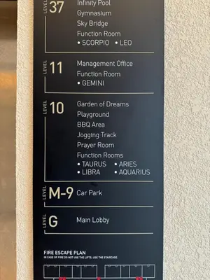 a menu on the wall of a restaurant at Astra At Axon Bukit Bintang KL in Kuala Lumpur
