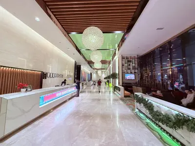 a lobby of a building with people in it at Platinum Klcc by StayAura in Kuala Lumpur