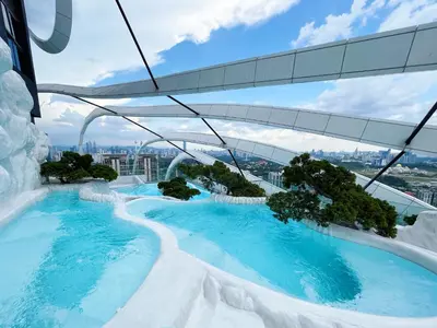 a view from the top of a building with a swimming pool at Arte Mont Kiara by whitedoorz Apartment in Kuala Lumpur