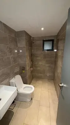 a bathroom with a toilet and a sink at M Arisa Sentul KL City view in Kuala Lumpur