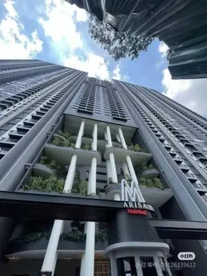 a tall building with plants on the side of it at M Arisa Sentul KL City view in Kuala Lumpur