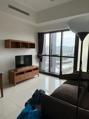 a living room with a flat screen tv and a couch at M-City, Jalan Ampang in Kuala Lumpur