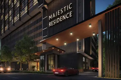 a red car parked in front of a building at Majestic KLCC By Flora in Kuala Lumpur