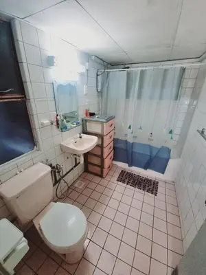 a bathroom with a toilet and a sink and a shower at Shahana Homestay KL for musleem in Kuala Lumpur