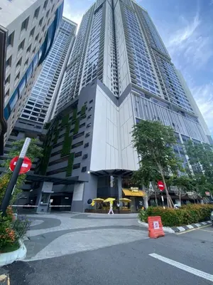 a tall building with a street in front of it at Agile Bukit Bintang KL in Kuala Lumpur