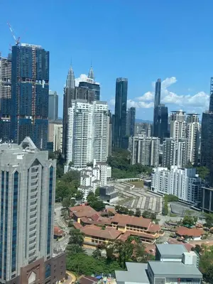 a view of a city with tall buildings at Agile Bukit Bintang KL in Kuala Lumpur