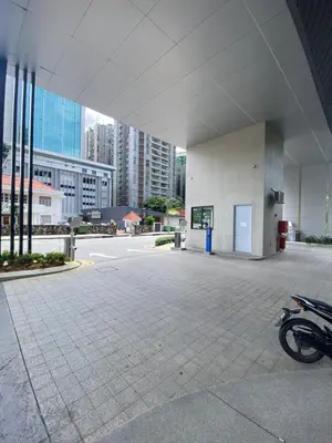 a parking lot with a motorcycle parked in a building at Agile Bukit Bintang KL in Kuala Lumpur