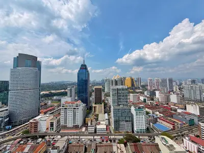 a view of a city with many tall buildings at Majestic Wonder Studio Suite with Infinity Pool in Kuala Lumpur