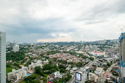 an aerial view of a city with tall buildings at 38 Bangsar by Feel Home in Kuala Lumpur