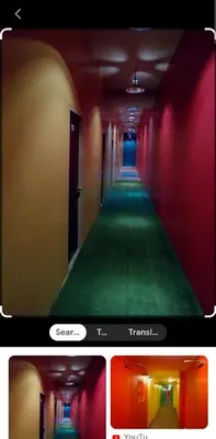 a picture of a hallway with red and green carpet at Platinum Inn Bukitbintang in Kuala Lumpur