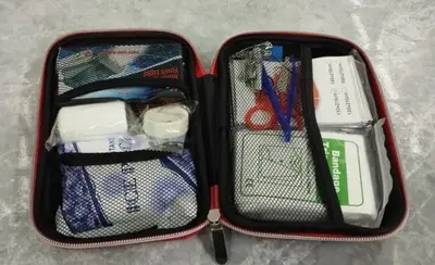 an open suitcase with various items in it at Segambut Homestay MITEC KLCC PWTC town center in Kuala Lumpur