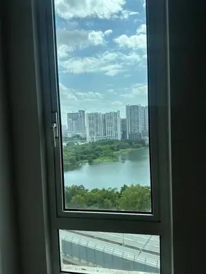 a window with a view of a body of water at Desa green unit in Kuala Lumpur