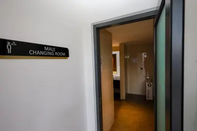 a sign that reads wake changing room in a hallway at M Arisa KL City View by AT in Kuala Lumpur